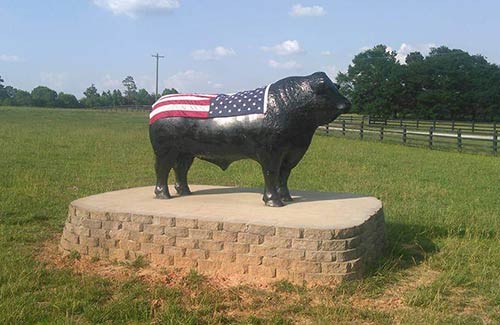 Bull Statue with Flag
