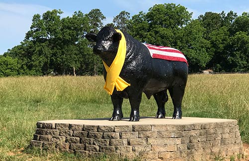 Bull Statue with Flag